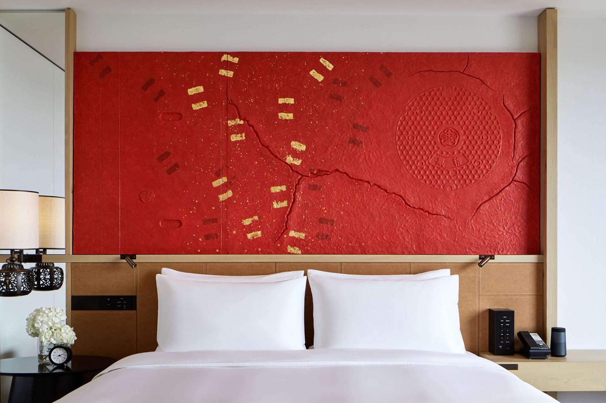 Hyatt Centric Kanazawa Buitenkant foto A bed with a headboard